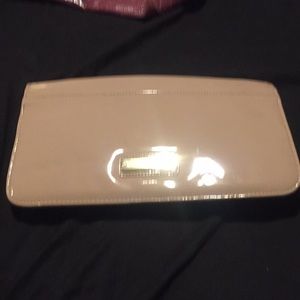 Brand new Steve clutch hand bag